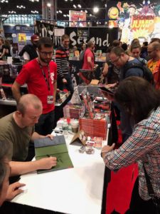 Ennis at the AfterShock Comics booth at NYCC 2016.